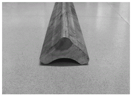 Forming process of a medium-strength heat-resistant magnesium alloy triangular profile