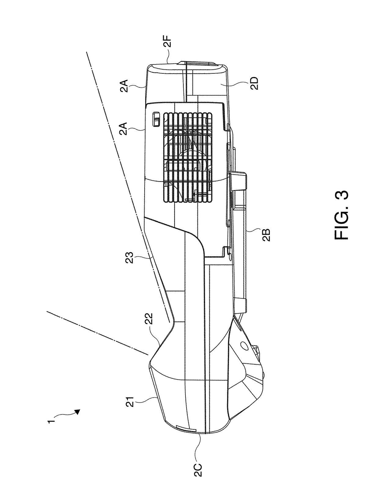 Projector having reflecting mirror disposed within housing and operation buttons disposed on sidewall of the housing