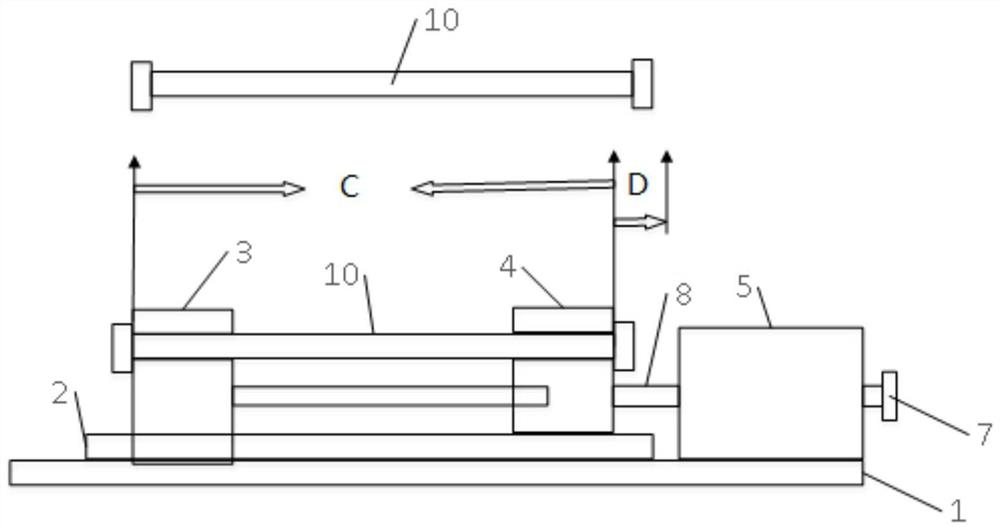 Strain calibration device and method for optical fiber sensor
