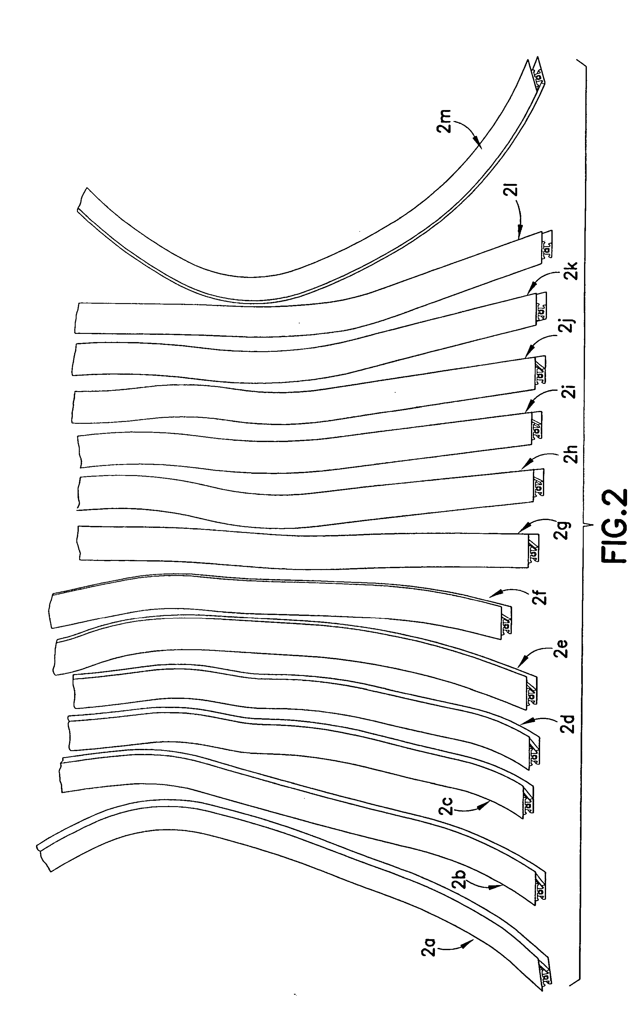 Method for reducing camber in coiled plastic ribbon or tape