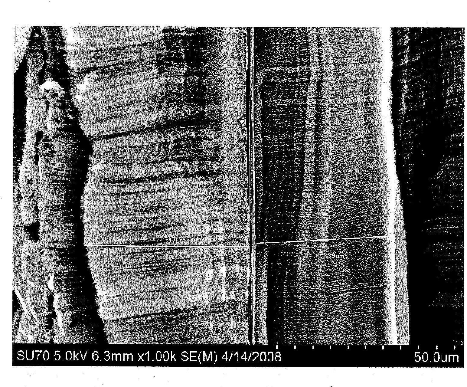 Metal matrix composite materials containing carbon nanotube-infused fiber materials and methods for production thereof