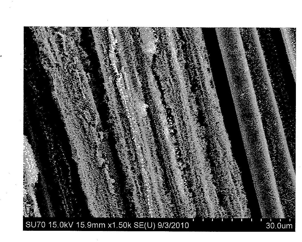 Metal matrix composite materials containing carbon nanotube-infused fiber materials and methods for production thereof