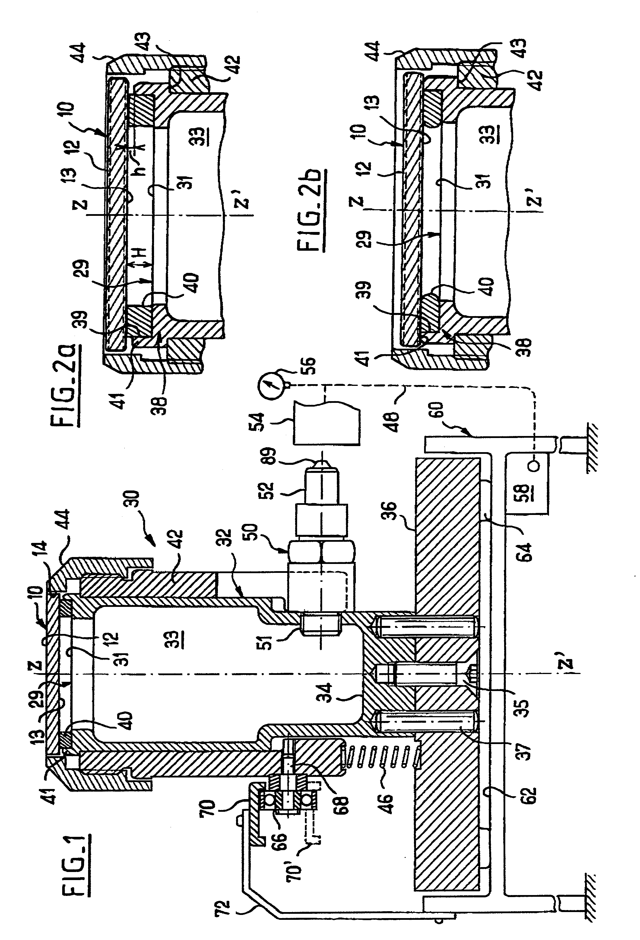 Chip holding arrangement, pad printing system incorporating the arrangement, and method of pad pringting a chip using the arrangement