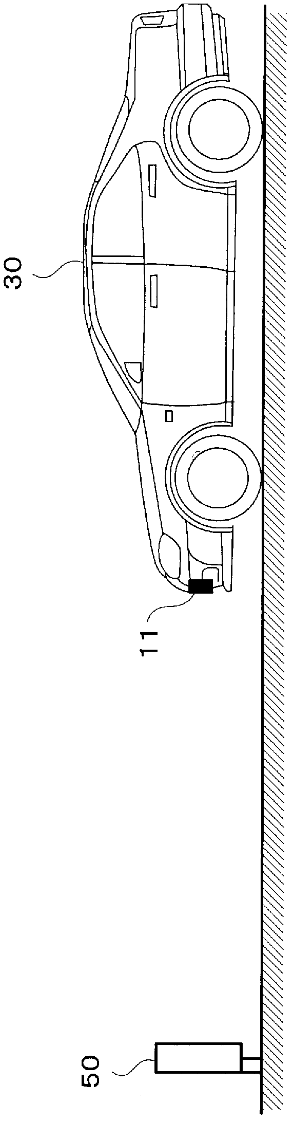 Image capturing device, adjusting device, and optical axis adjusting system for image capturing device