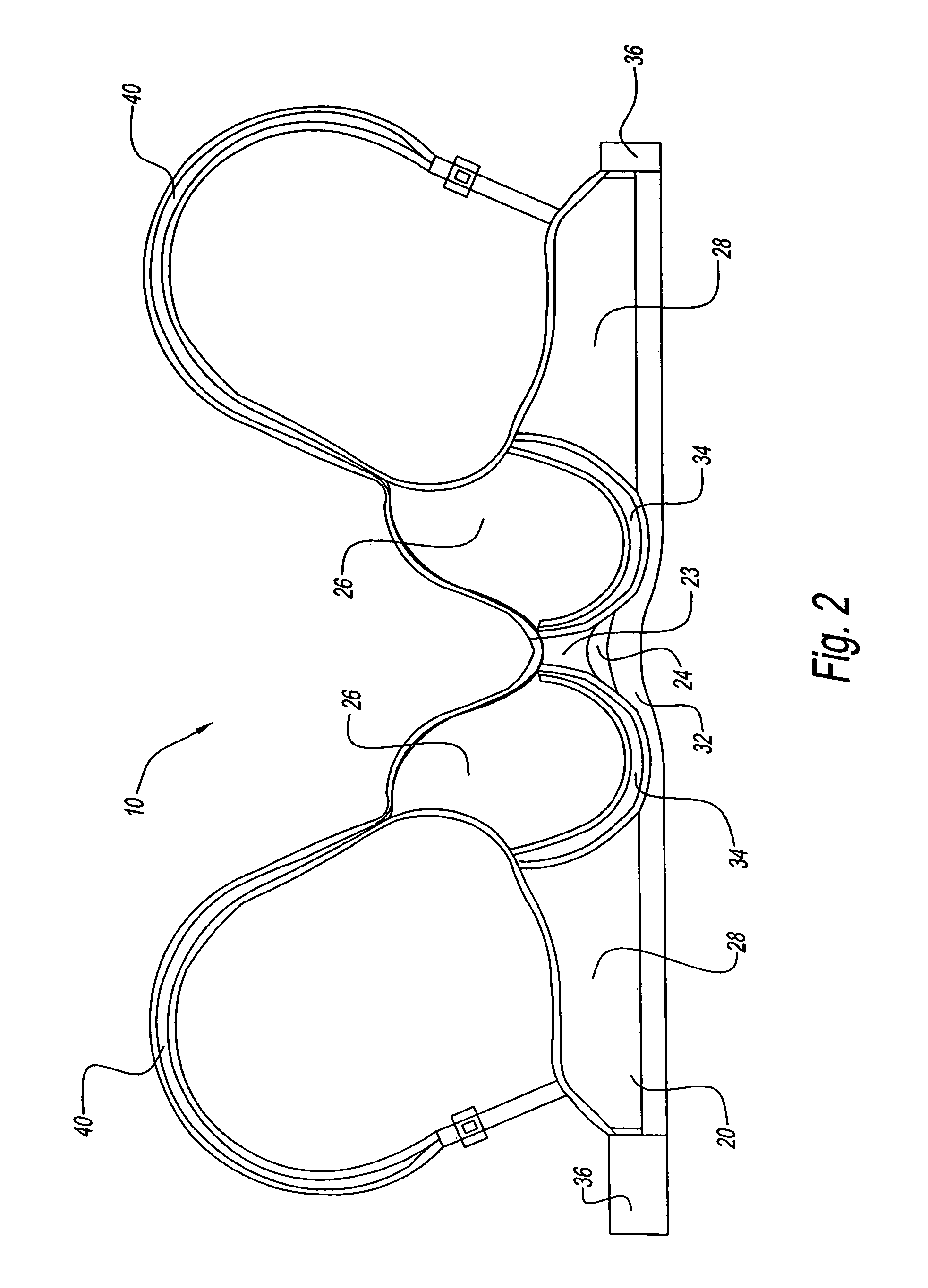 Circular knit bra having different areas of stretchability and method of making the same