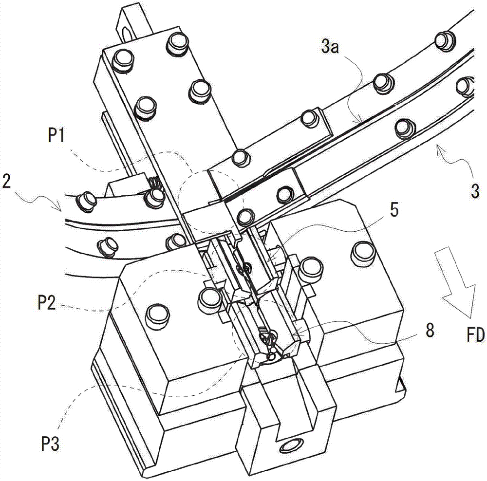 Assembling device for button fixing members