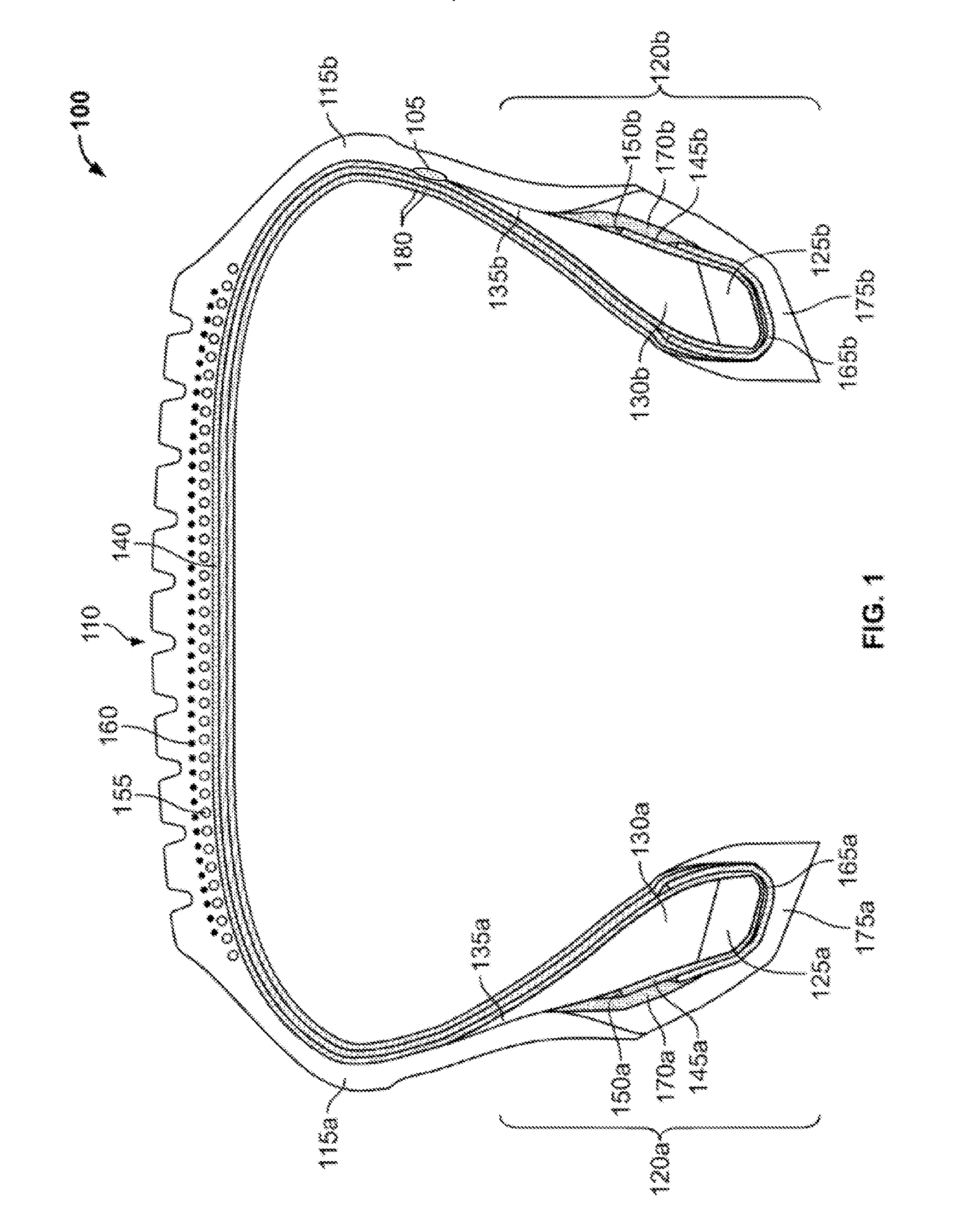 Tire having embedded electronic device affixed with adhesive