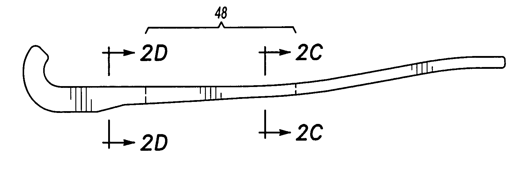 Attachment arrangement for a composite leaf spring which accommodates longitudinal movement through shear displacement