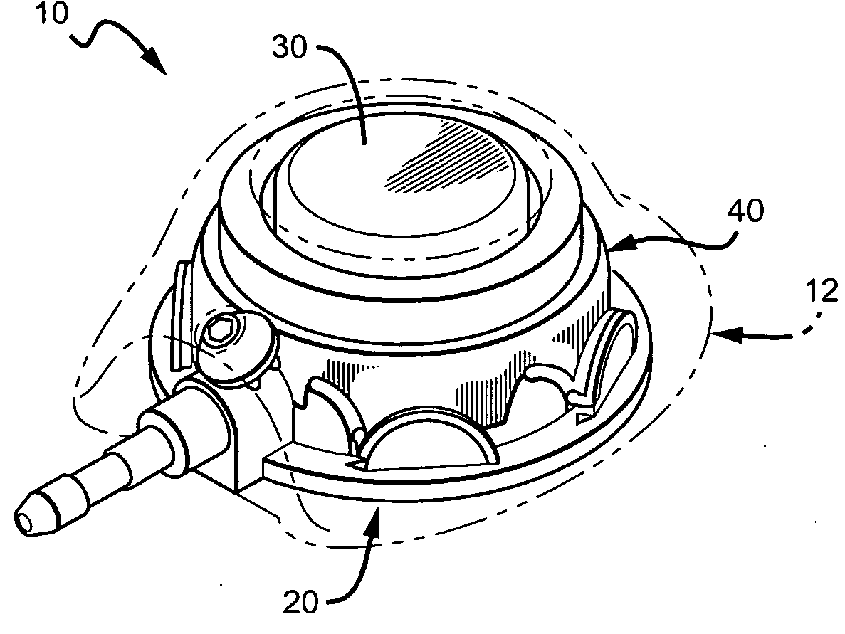 Vascular access port with integral attachment mechanism