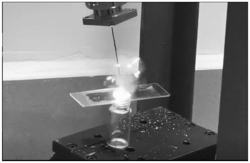 Titanium powder-polyvinylidene fluoride composite material for microwave ignition and preparation method thereof