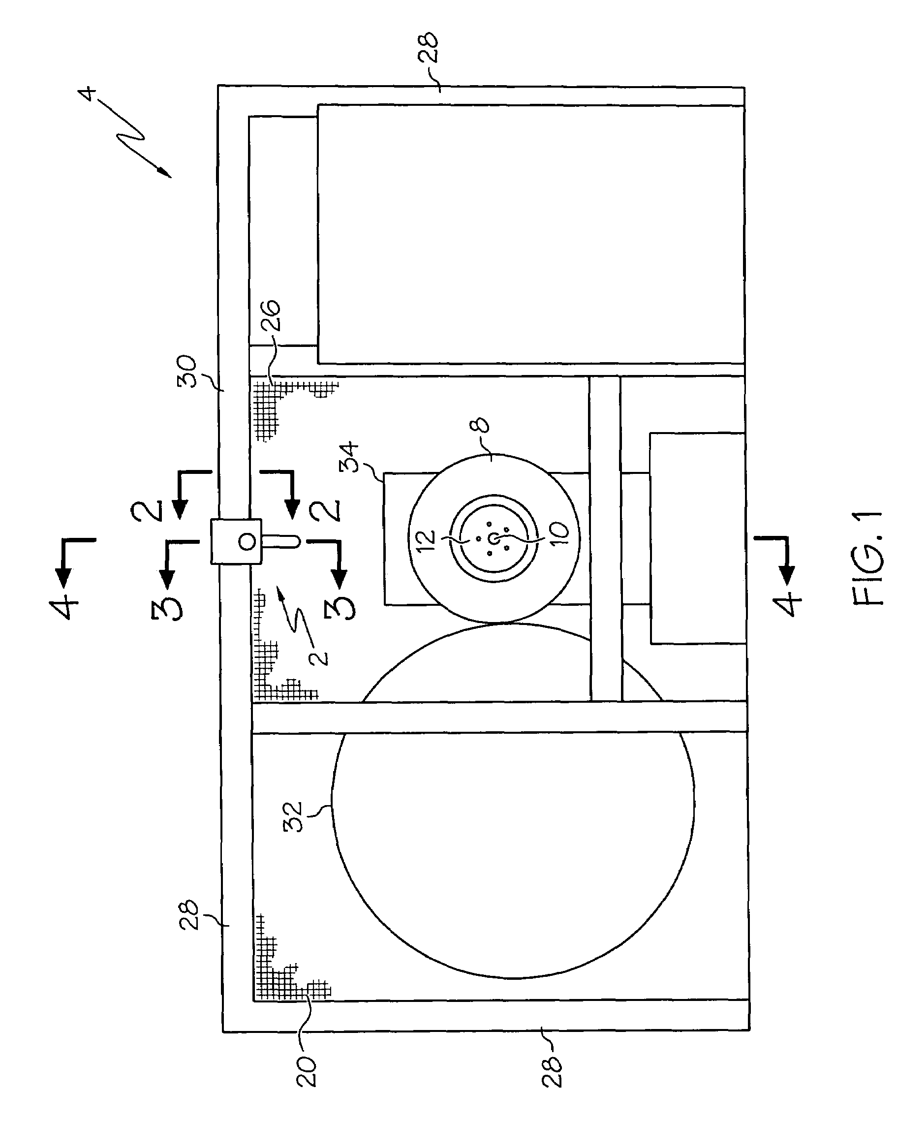 Tire testing machine with removable hanger hoist and method for loading a tire