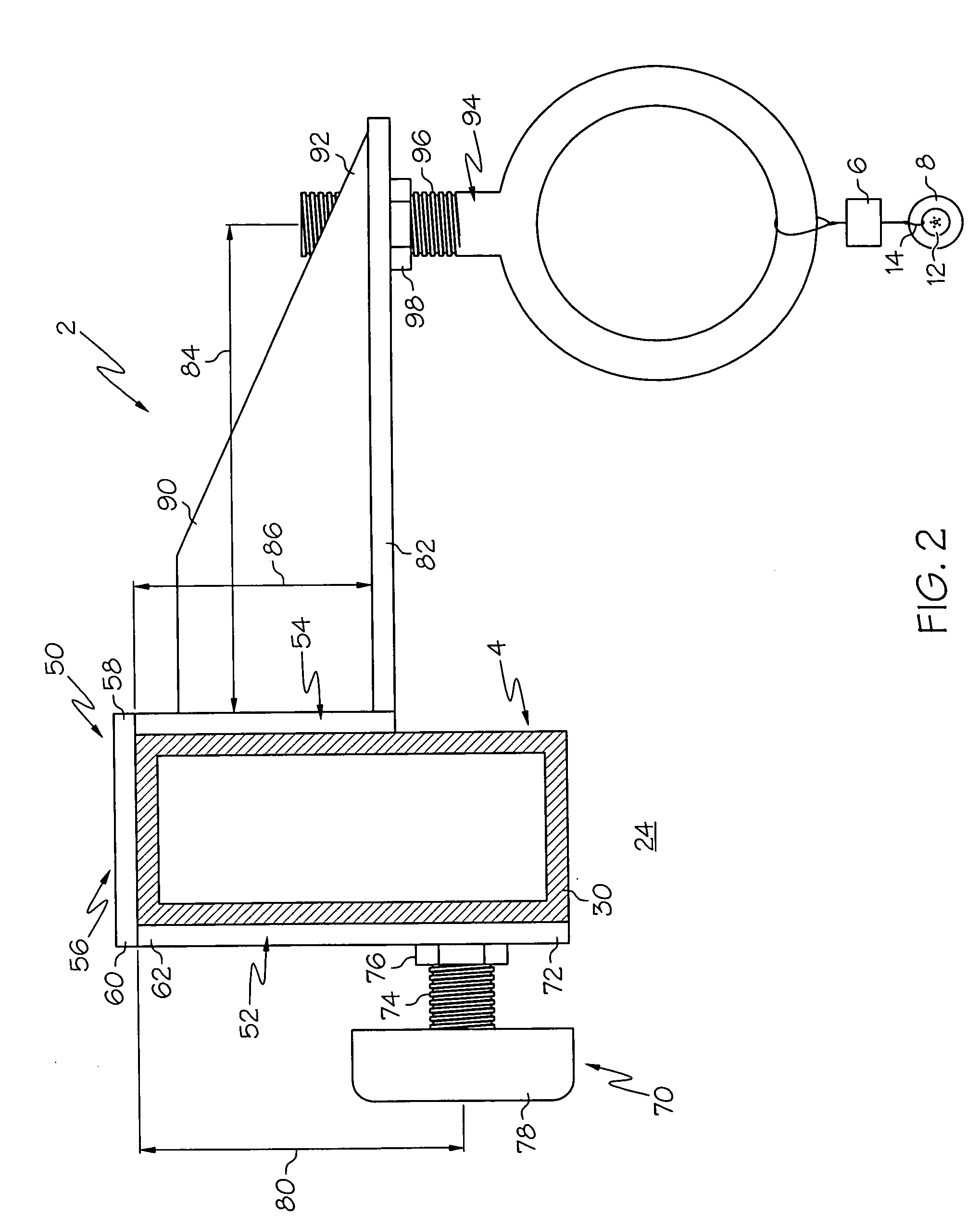 Tire testing machine with removable hanger hoist and method for loading a tire