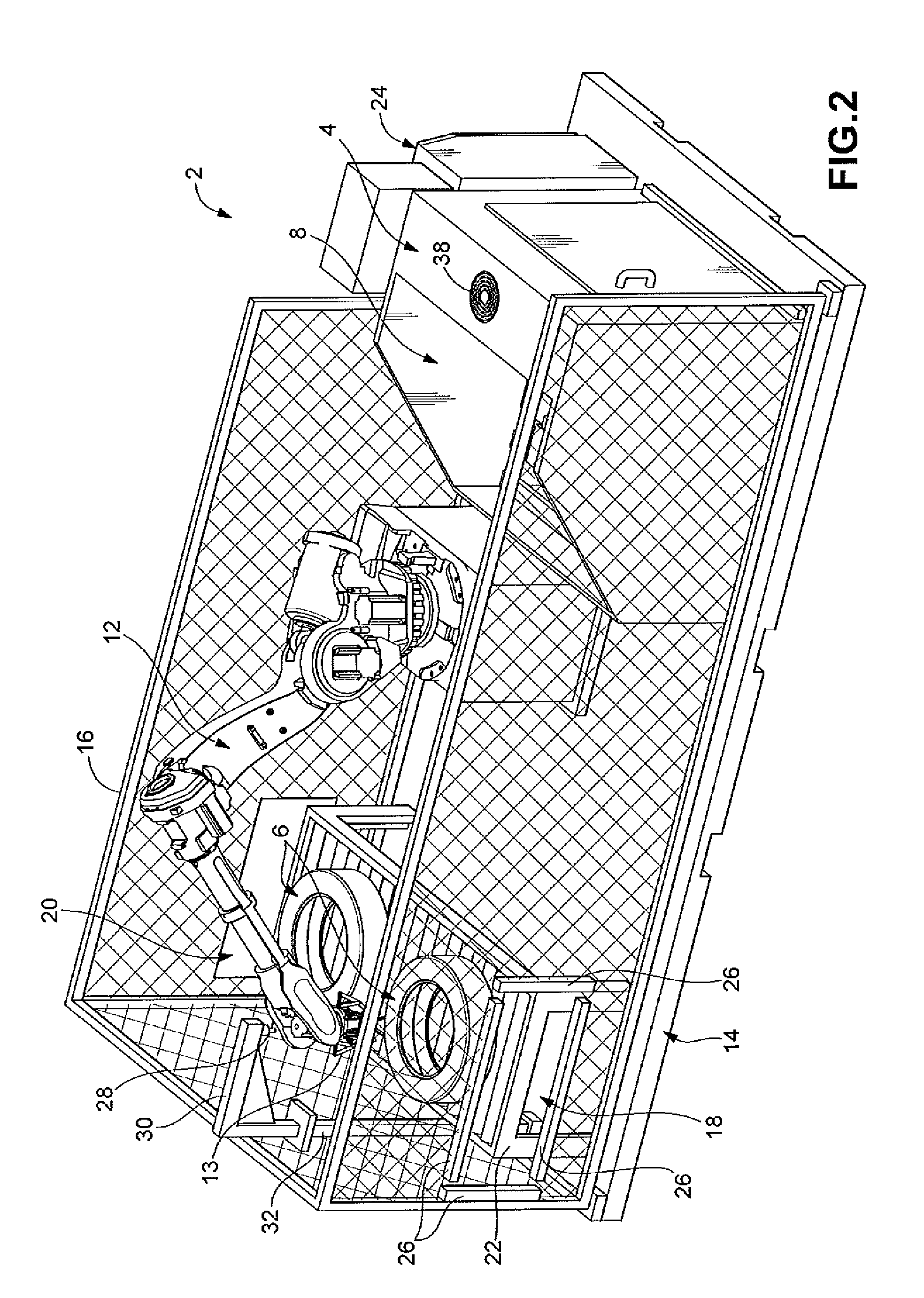 Modular system with platformed robot, booth, and fluid delivery system for tire spraying