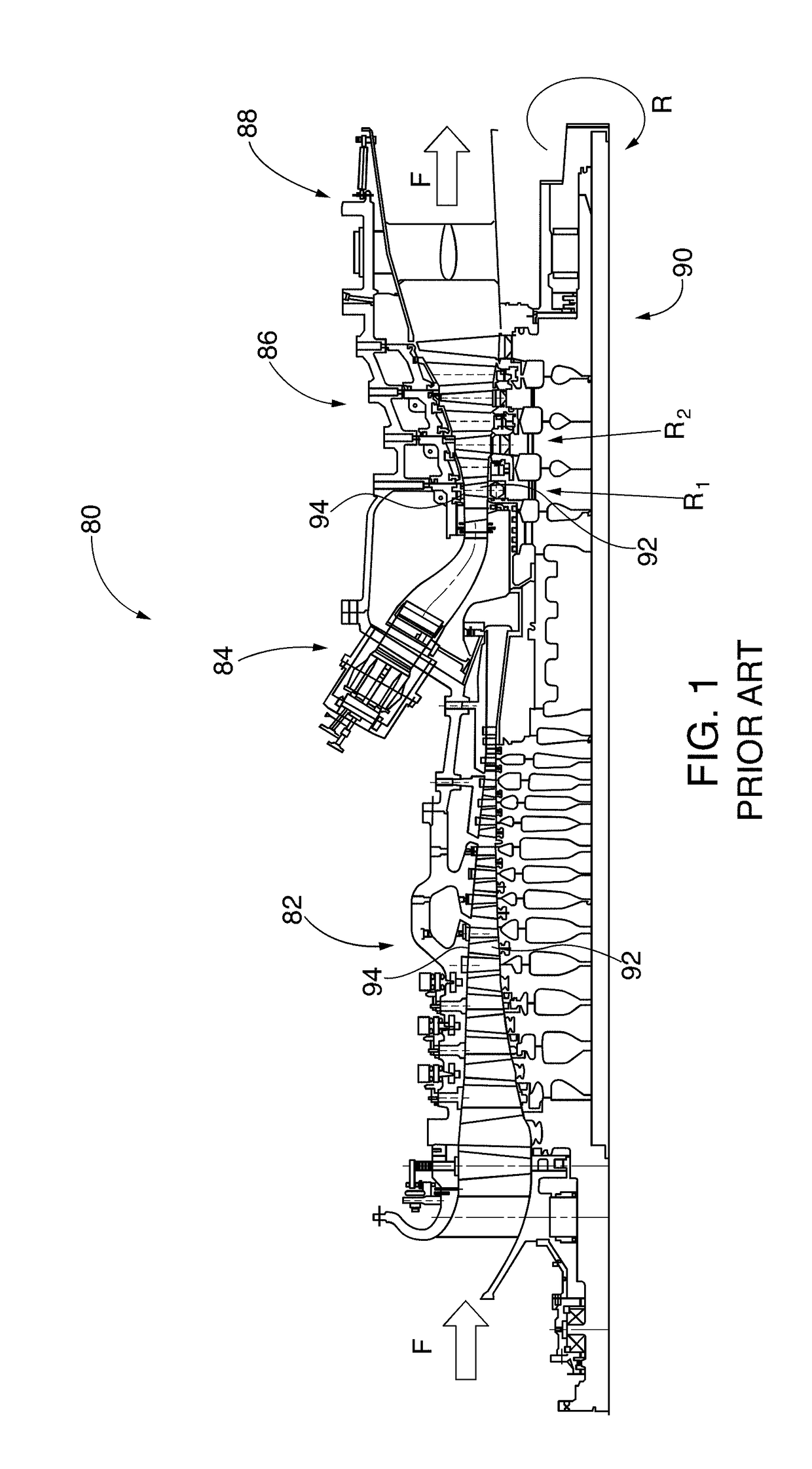 Turbine shroud with abradable layer having dimpled forward zone