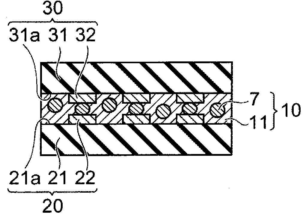 Adhesive and connecting structure using the same