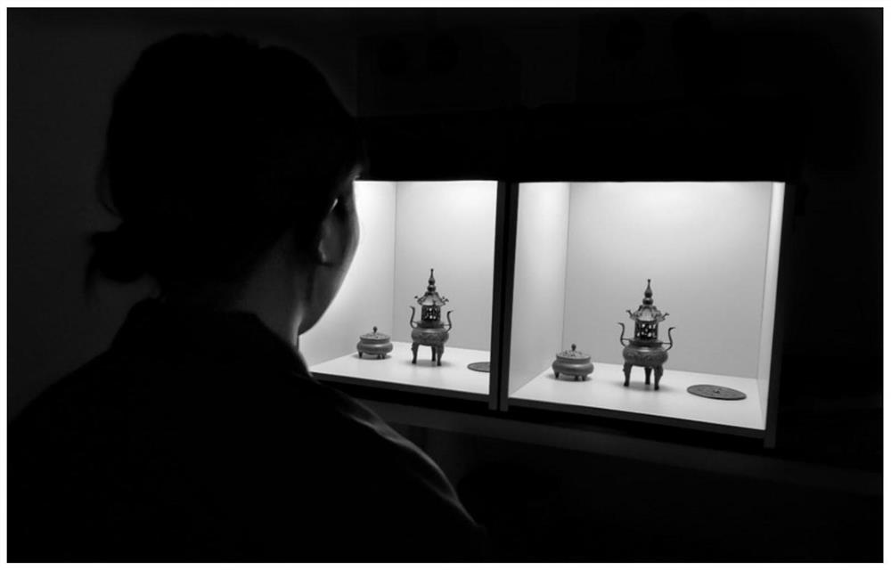 A method and system for evaluating the quality of lighting light for bronze ware exhibition