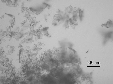 A method for preparing flaky ibuprofen crystals from aqueous solution by adding crystal form control agent