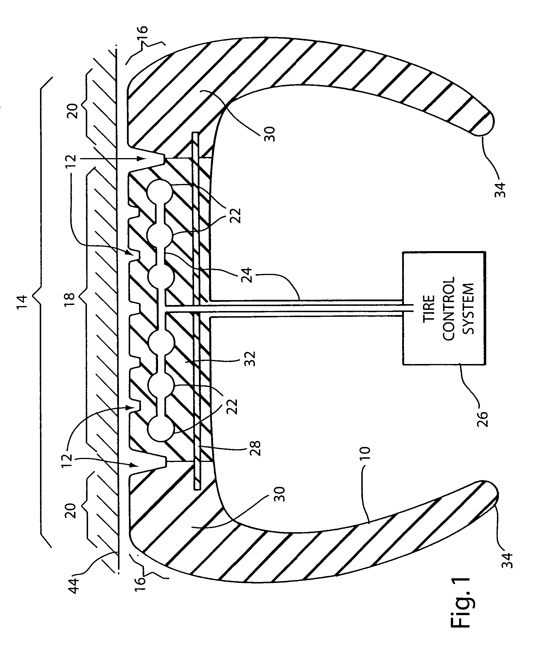 Fuel efficient vehicle tire having a variable footprint and low rolling resistance