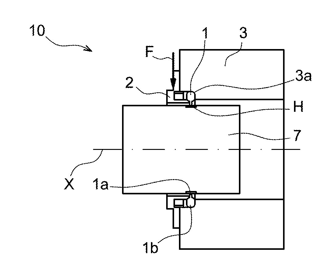 Seal assembly for a turbine engine comprising means for lubricating a brush seal