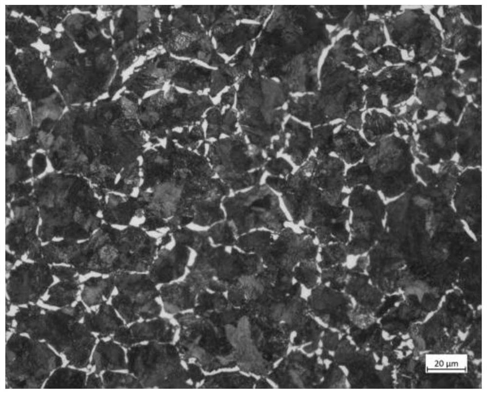 Heavy-duty locomotive wheel steel resistant to surface contact fatigue and wheel production method