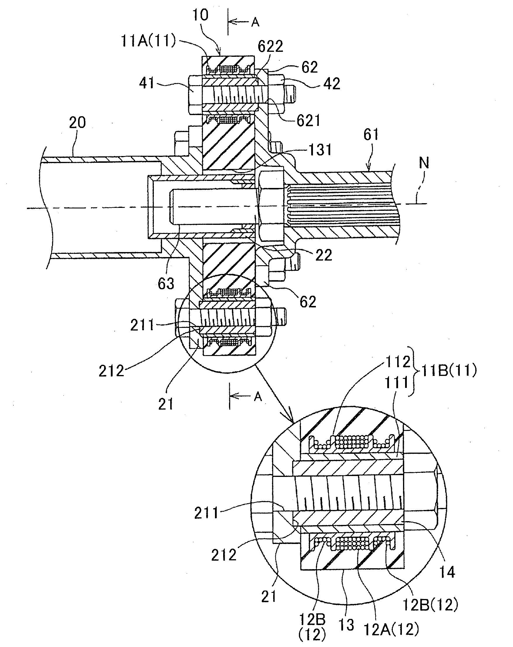 Flexible coupling and vehicle motive power transmission apparatus