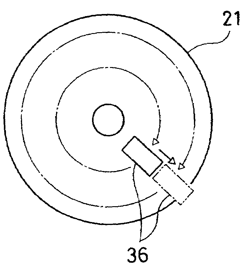 Printing device for carrying out a printing operation on a surface of a disk