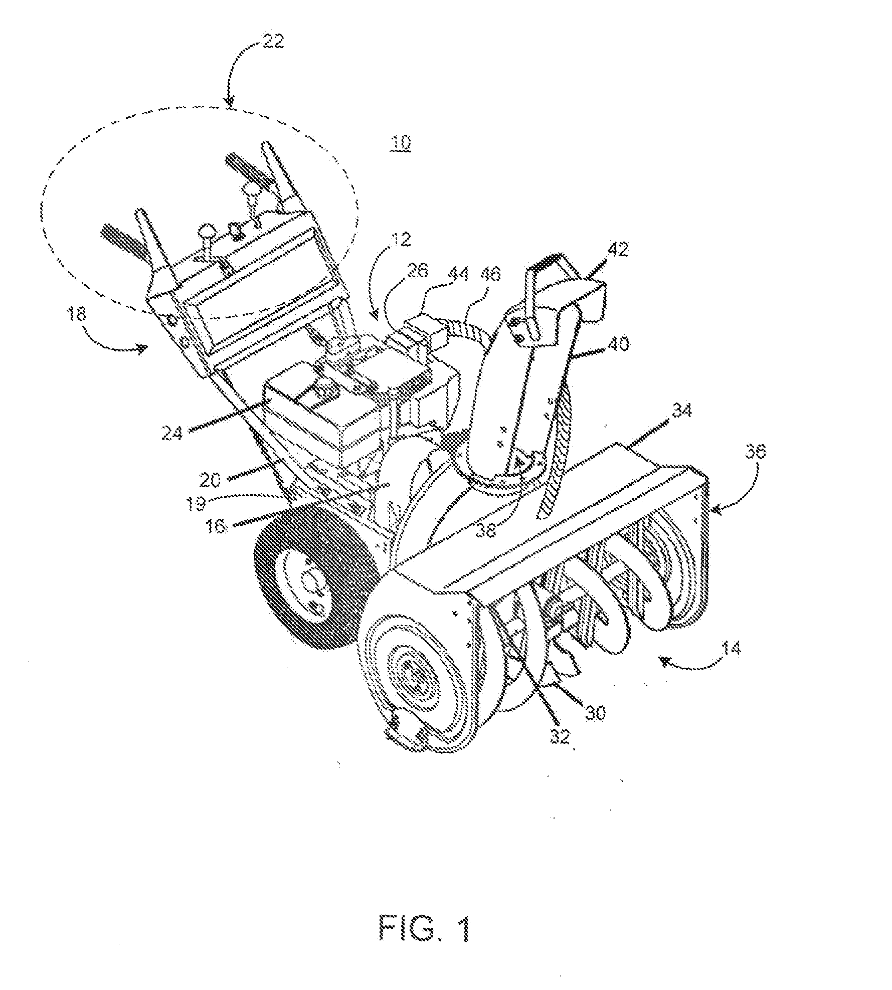 Apparatus and method for mitigating freezing of a snow handling mechanism in a snow blower
