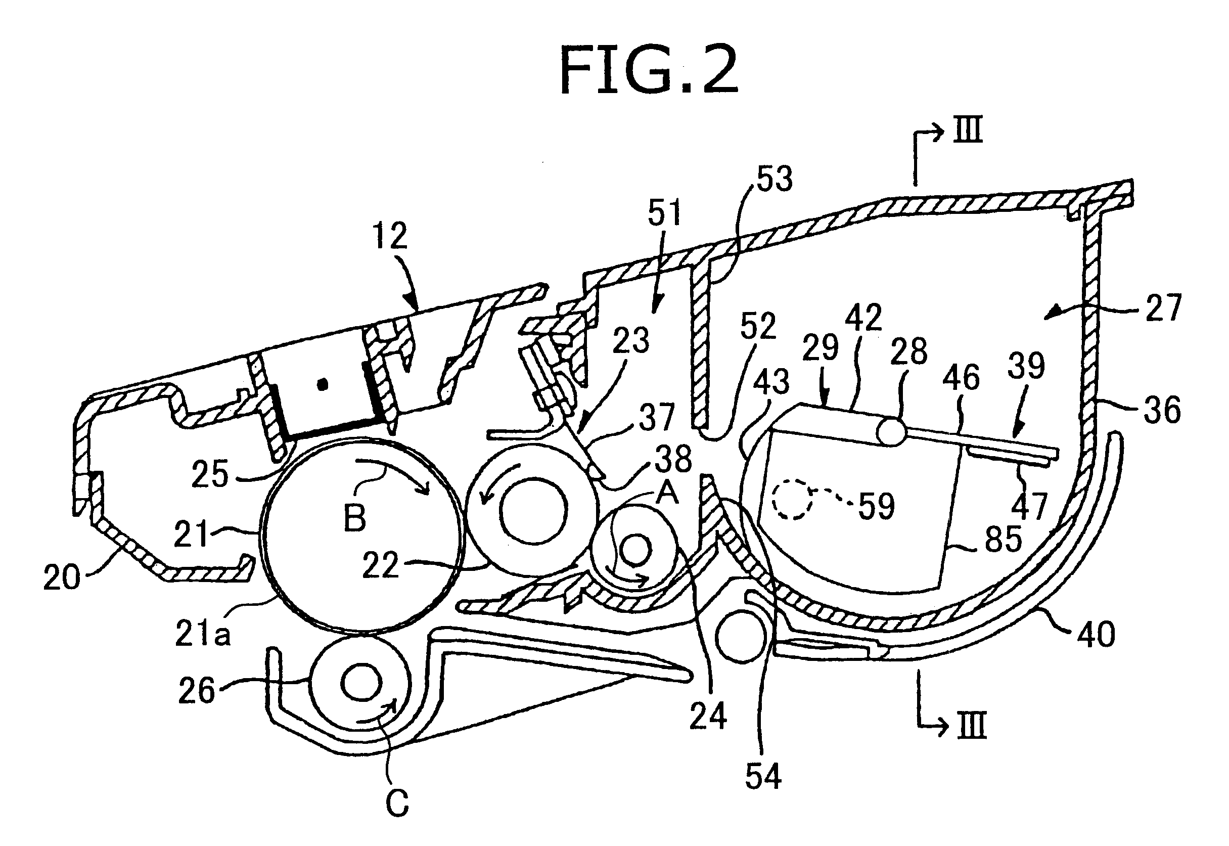 Developing cartridge with agitator driven to rotate independent from developing roller