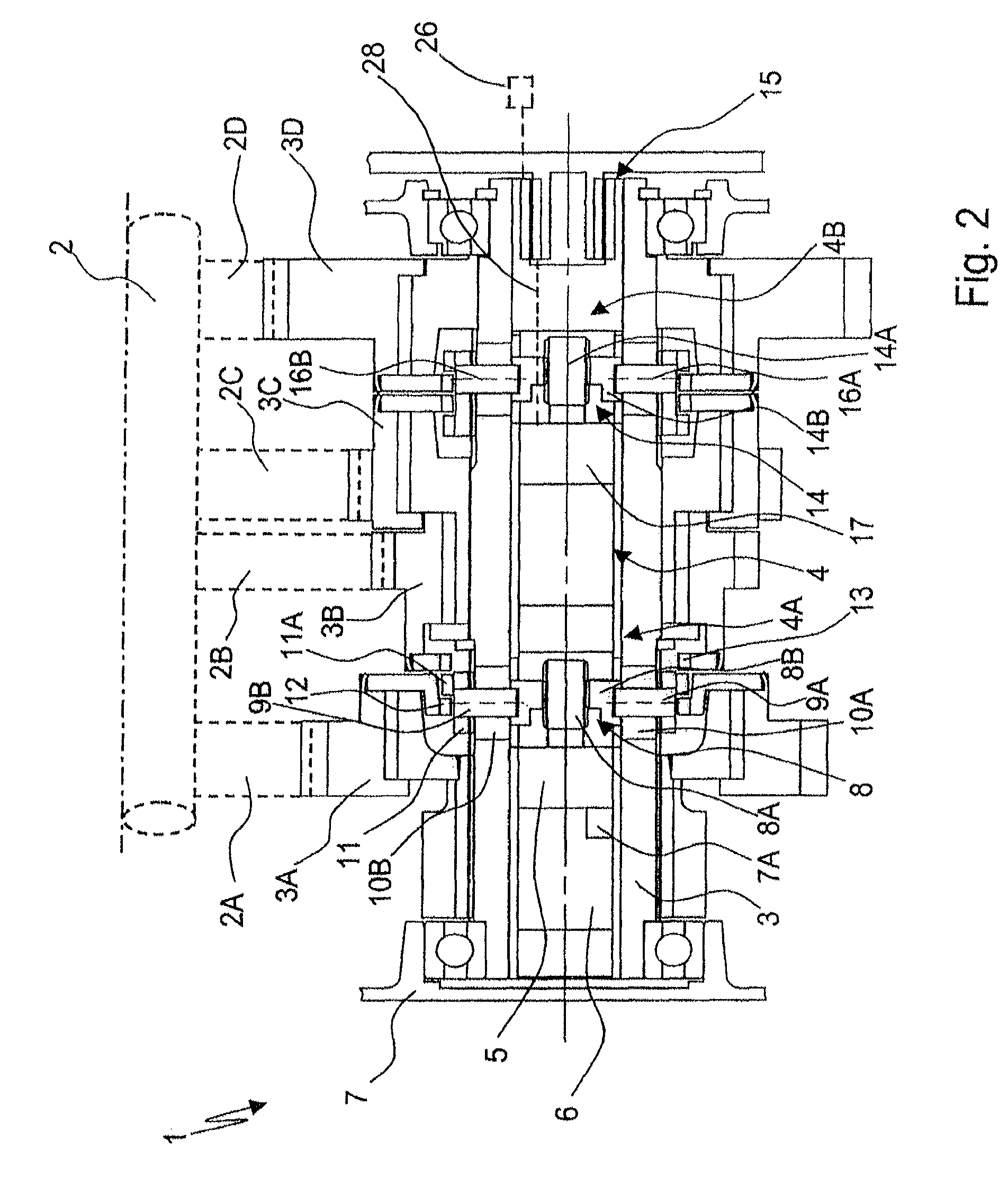 Device for actuating a gearwheel, which is designed as a loose wheel, of a transmission device