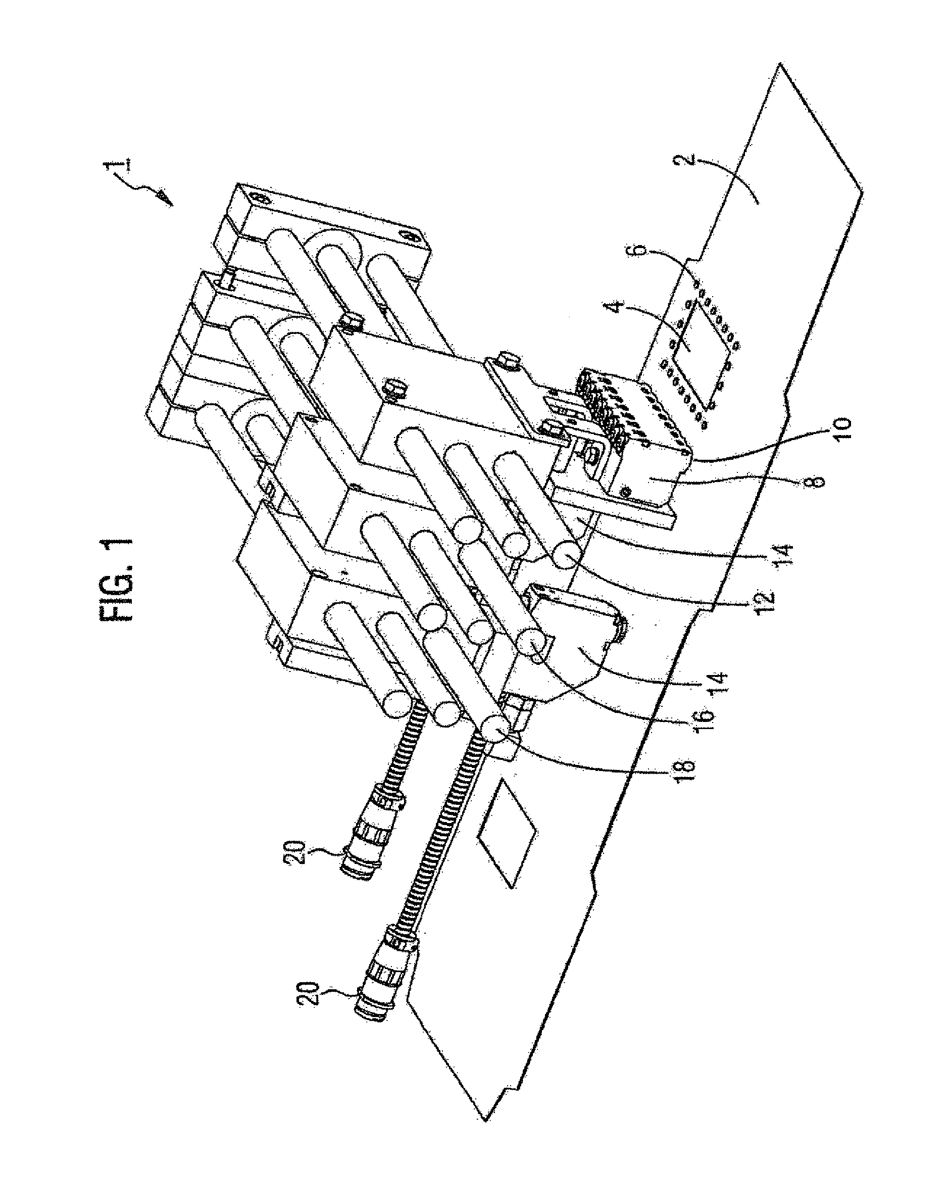Device for applying adhesive to a material
