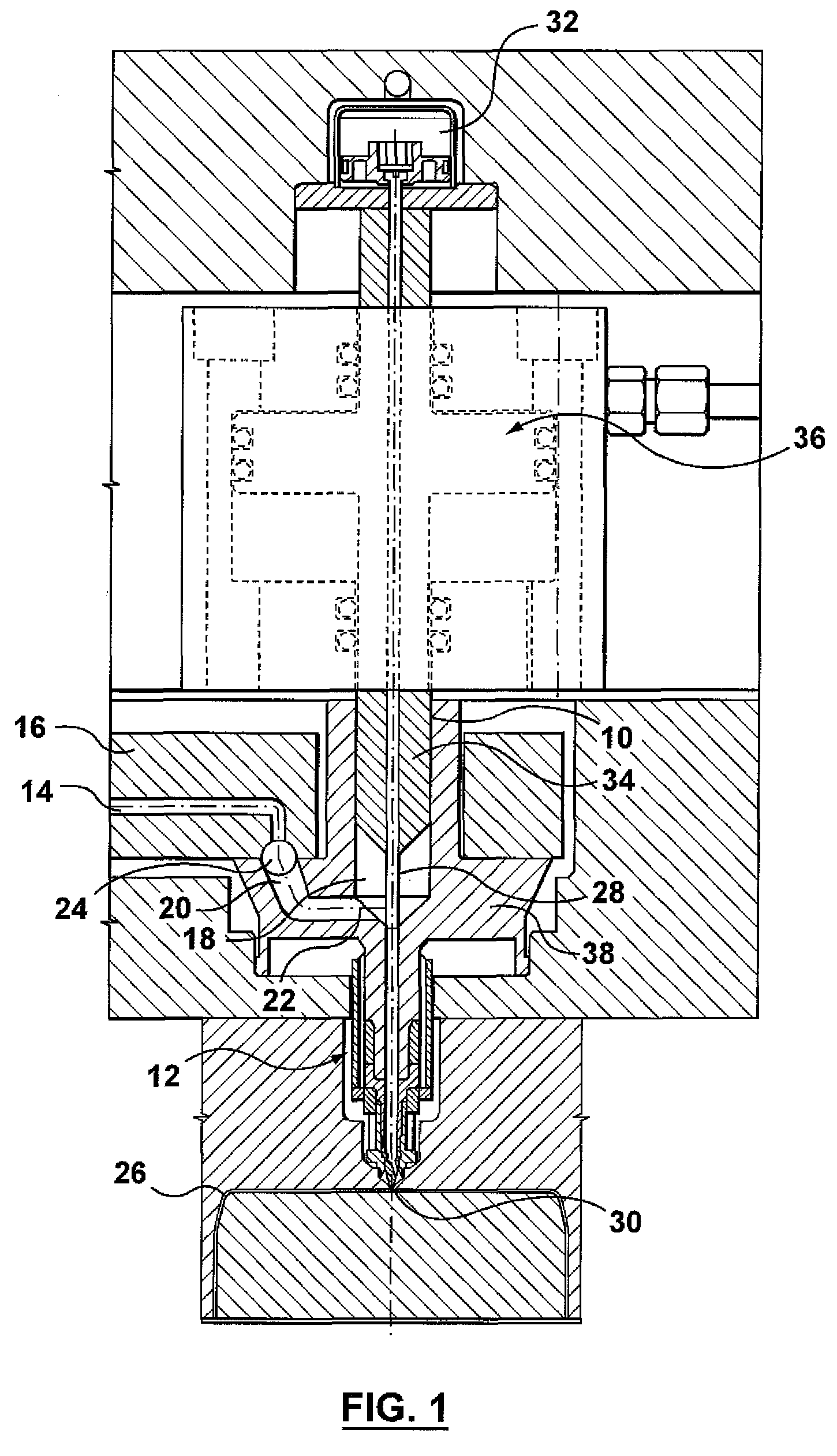 High pressure injection molding nozzle with low pressure manifold
