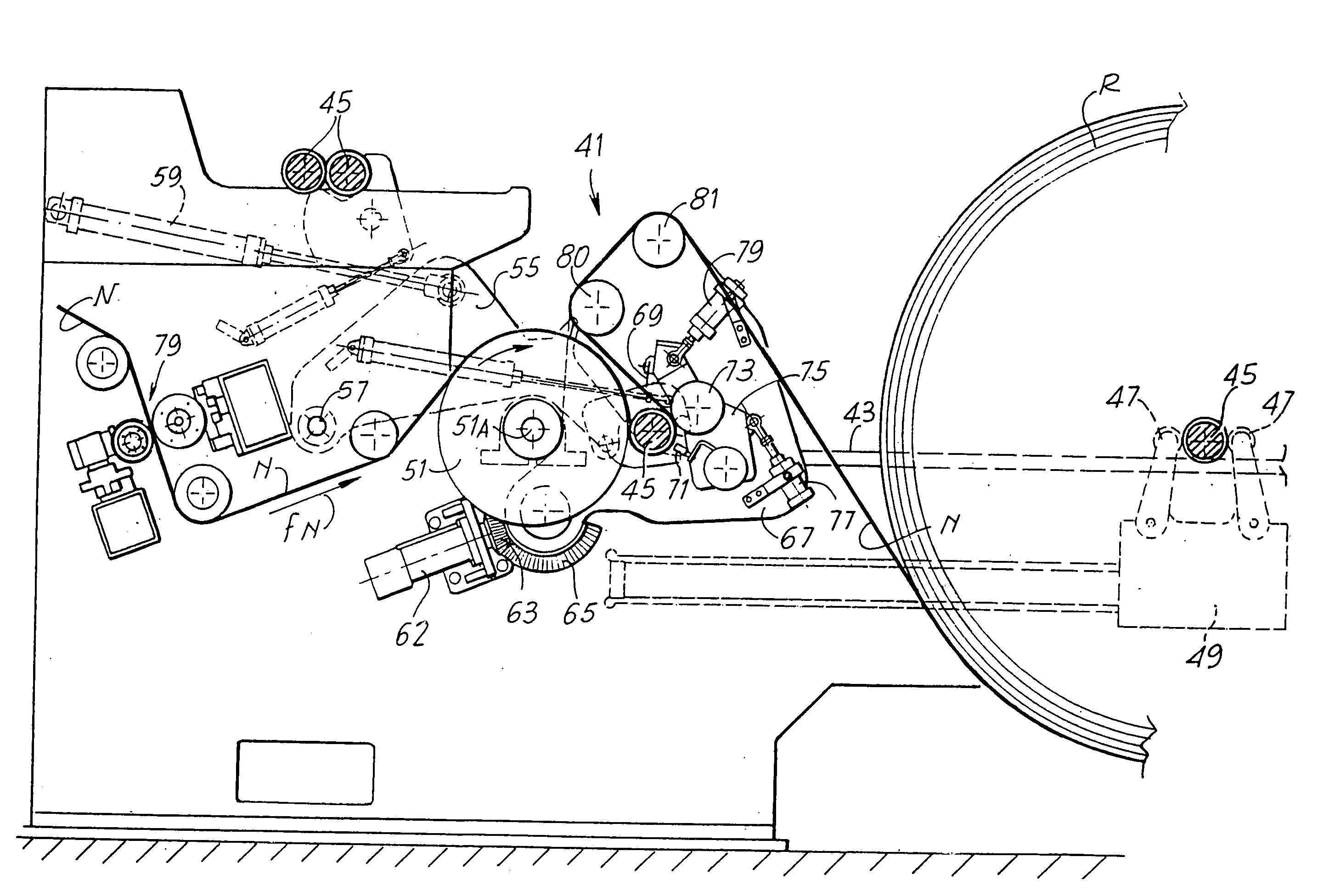 Winding or rewinding machine for producing rolls of web material around a winding spindle and relative winding method