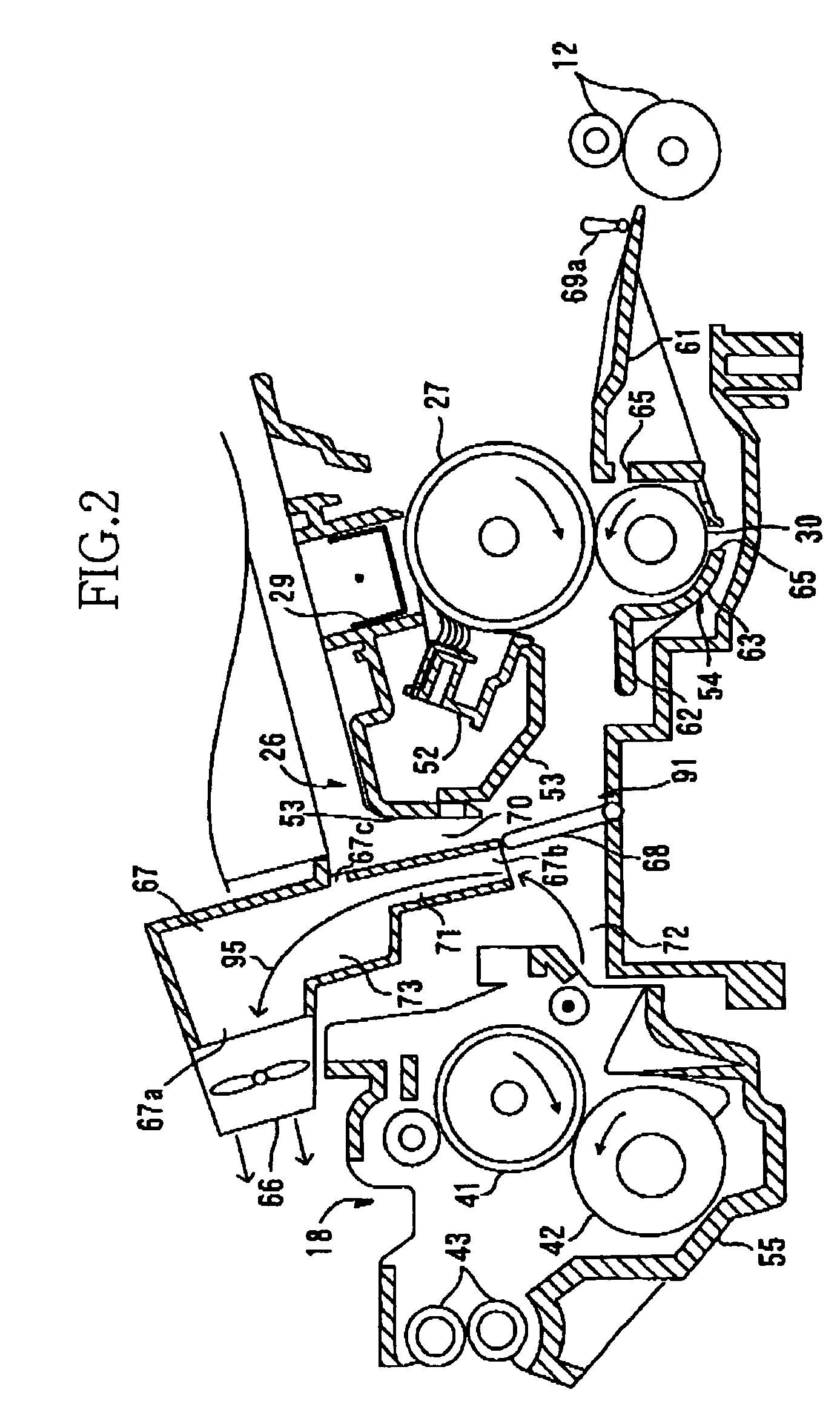 Image forming apparatus including air-flow direction changing around transferring device