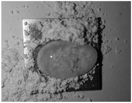 Method for etching super-hydrophobic aluminum alloy surface by laser and alkali solution recombination