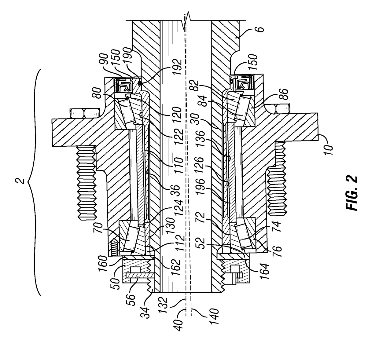 Spindle system for wheel alignment correction with brake adjustment