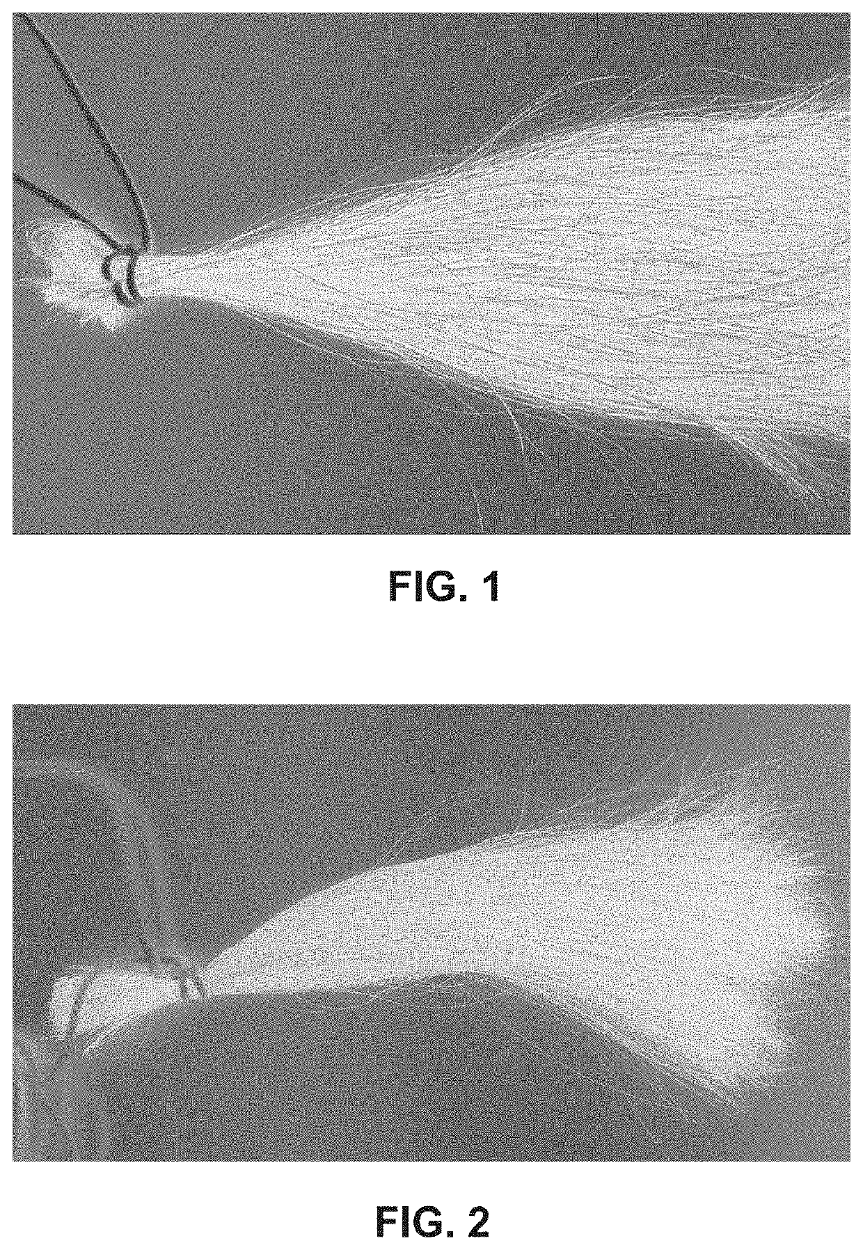 Hair-dyeing composition for minimizing ammonium hydroxide content and odor and method of producing the same