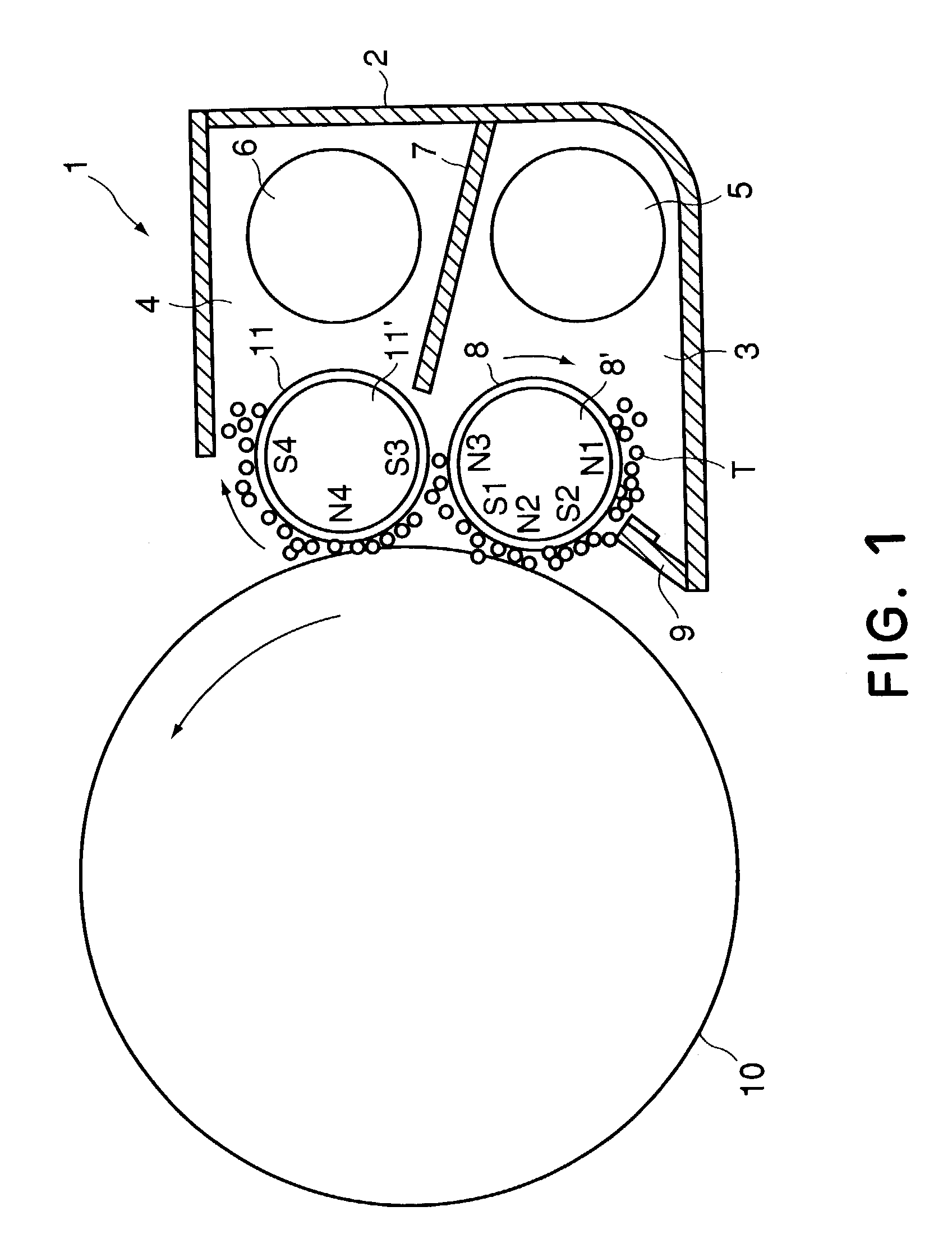 Developing apparatus with two developing chamber-rotatable member pairs