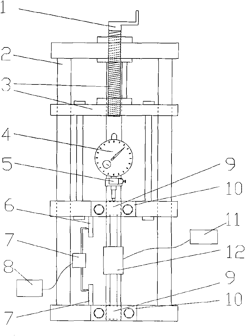 Calibrating device for vibrating string type strain transducer