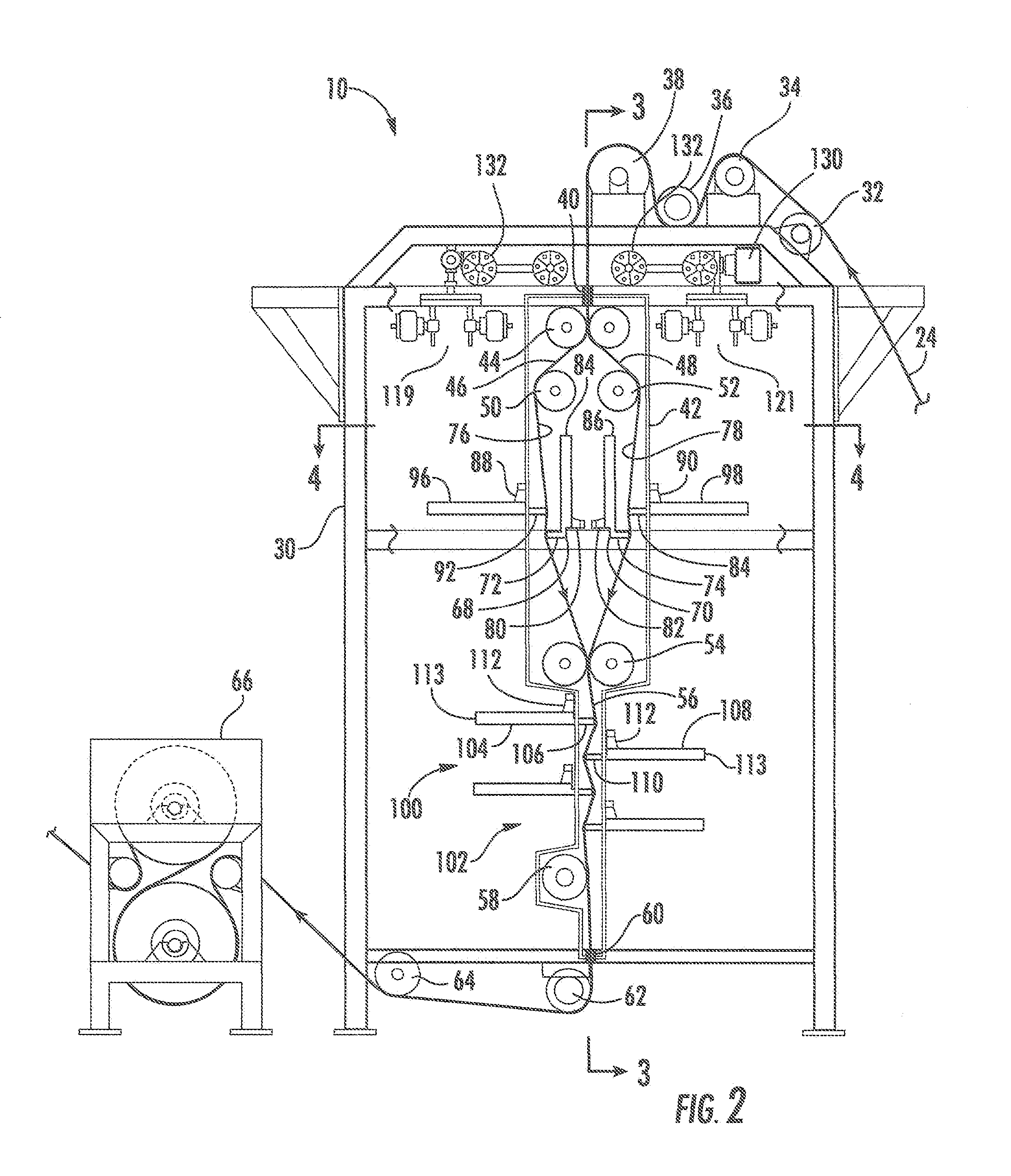 Apparatus and method of foam dyeing a traveling sheet of textile yarn