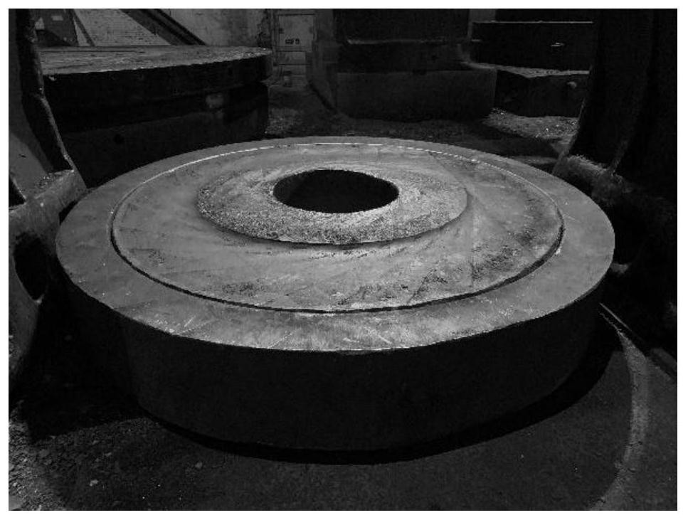 Manufacturing method of 9% Ni steel ultra-large-specification cake-shaped forge piece for ultralow-temperature engineering