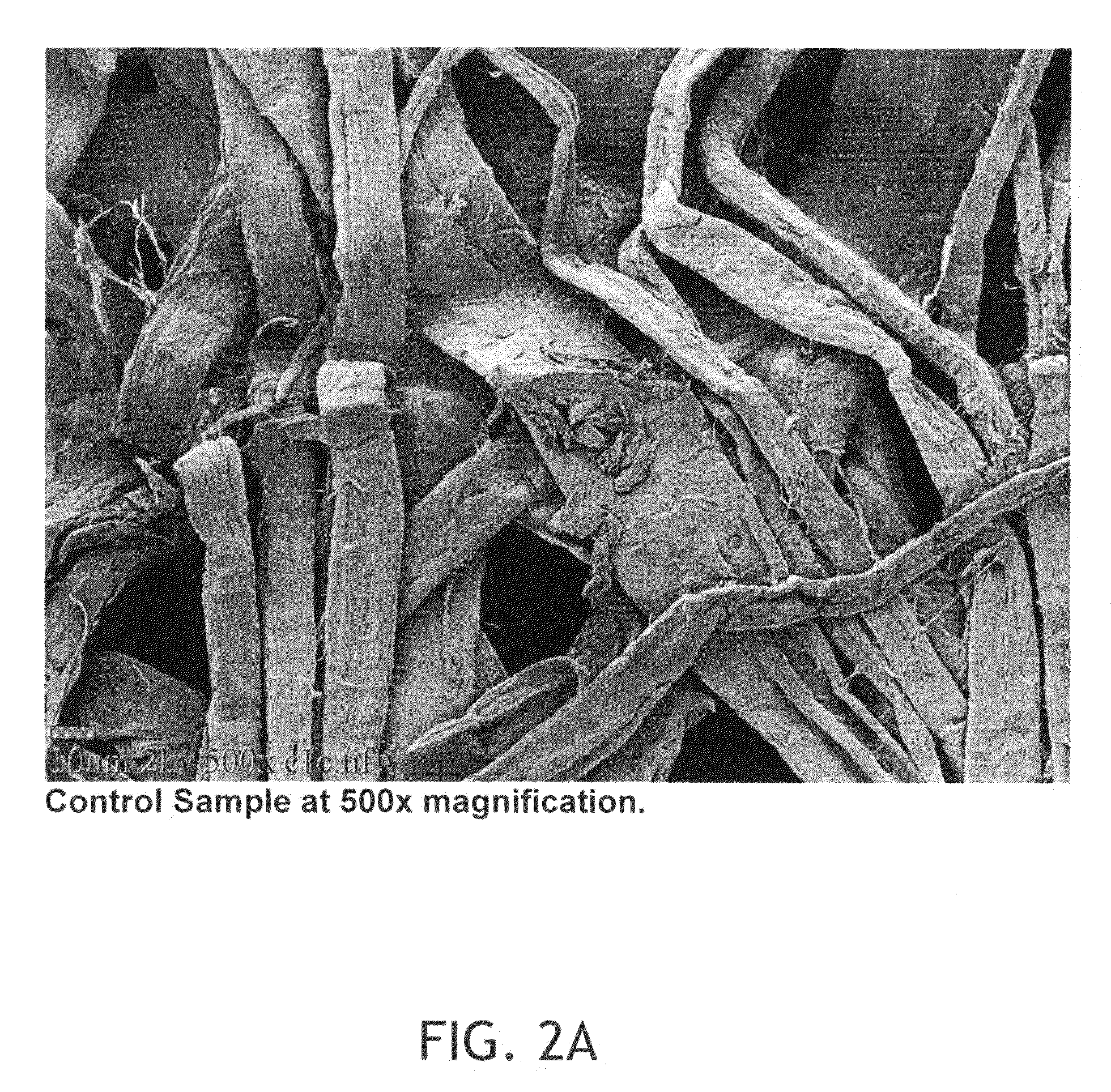 Tissue products containing non-fibrous polymeric surface structures and a topically-applied softening composition