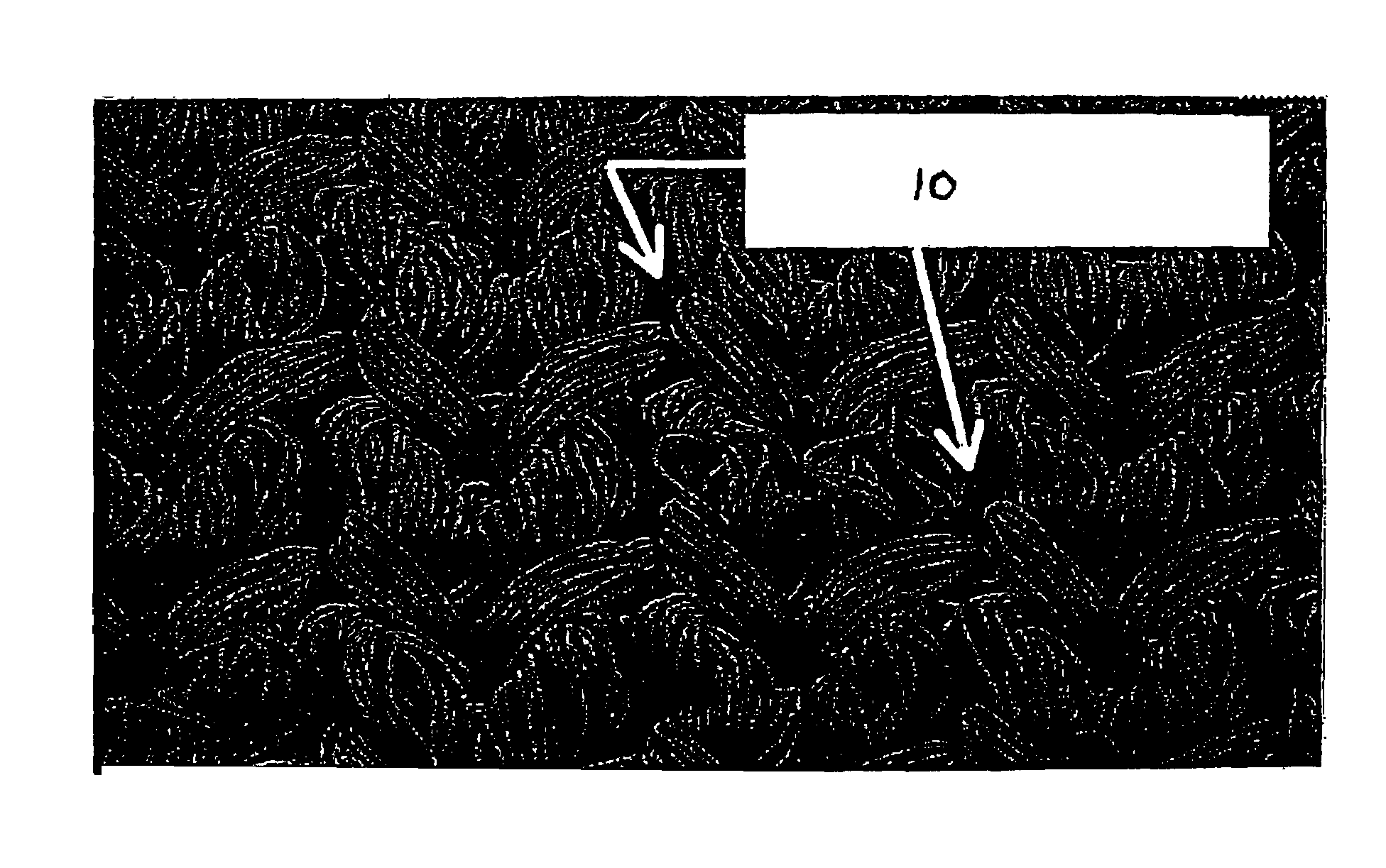 Blood-tight implantable textile material and method of making