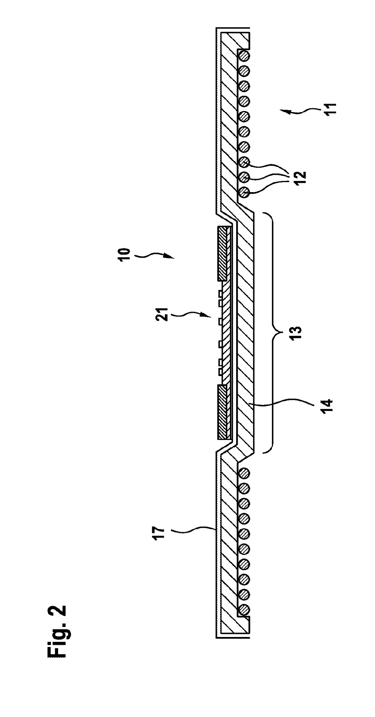 Transmission coil for the inductive transfer of energy