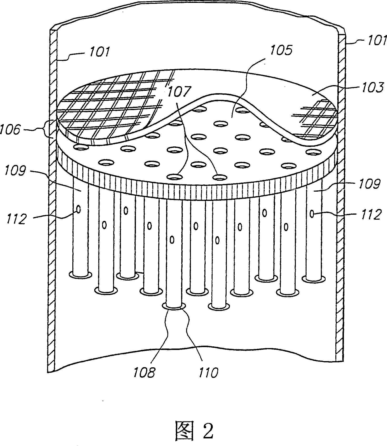 Upflow reactor system with layered catalyst bed for hydrotreating heavy feedstocks