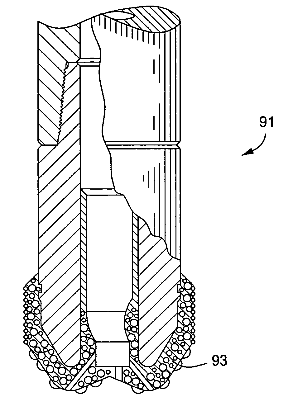 System, method, and apparatus for enhancing the durability of earth-boring bits with carbide materials