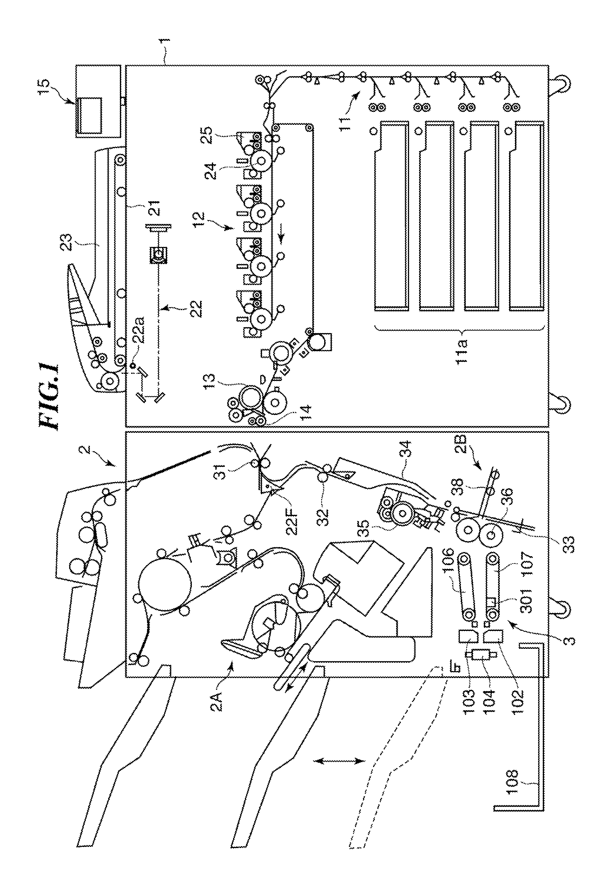 Sheet processing apparatus that flattens folded spine of sheet bundle and image forming apparatus including the sheet processing apparatus