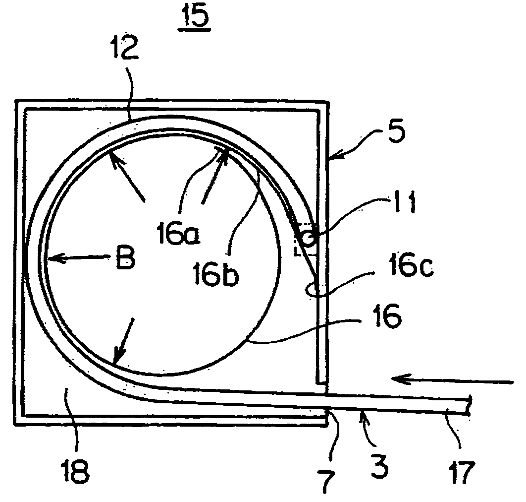 Wiring harness excess length absorbing device