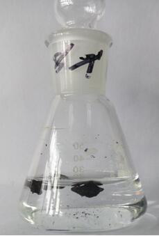 Method for preparing polyamidoxime/graphene nanobelt composite aerogel and method for separating and enriching uranium