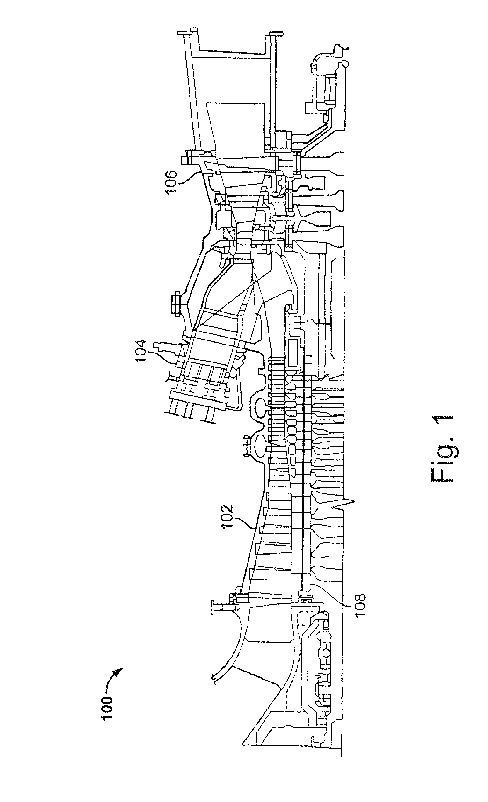 Seals for a turbine engine, and methods of assembling a turbine engine