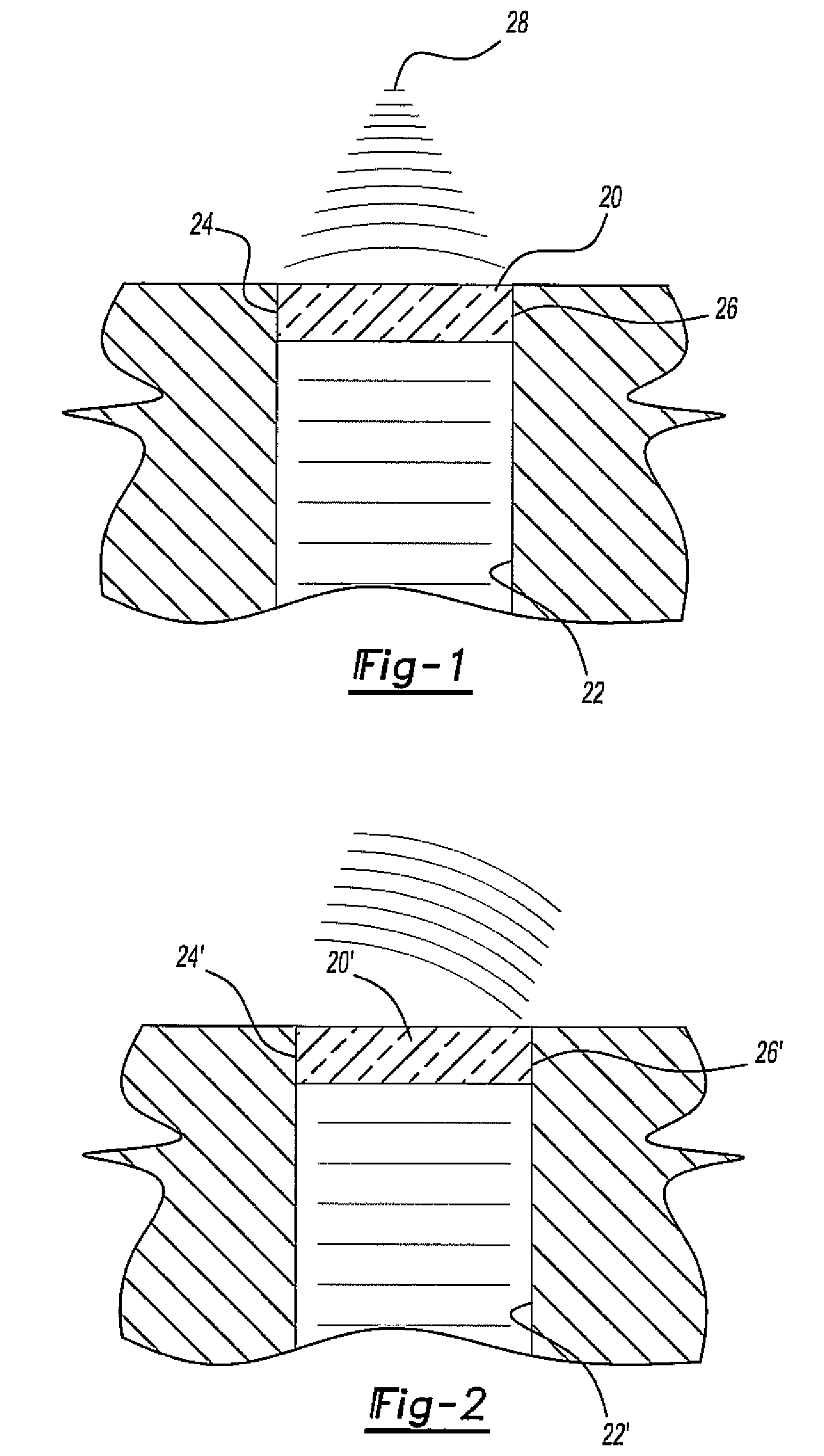 Gradient index lens for microwave radiation